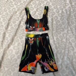 SKIMS Black Active Set with Green and Orange Accents